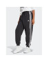 adidas Melegítő alsó Essentials 3-Stripes French Terry Loose-Fit Joggers HA4375 Fekete Loose Fit - Pepit.hu