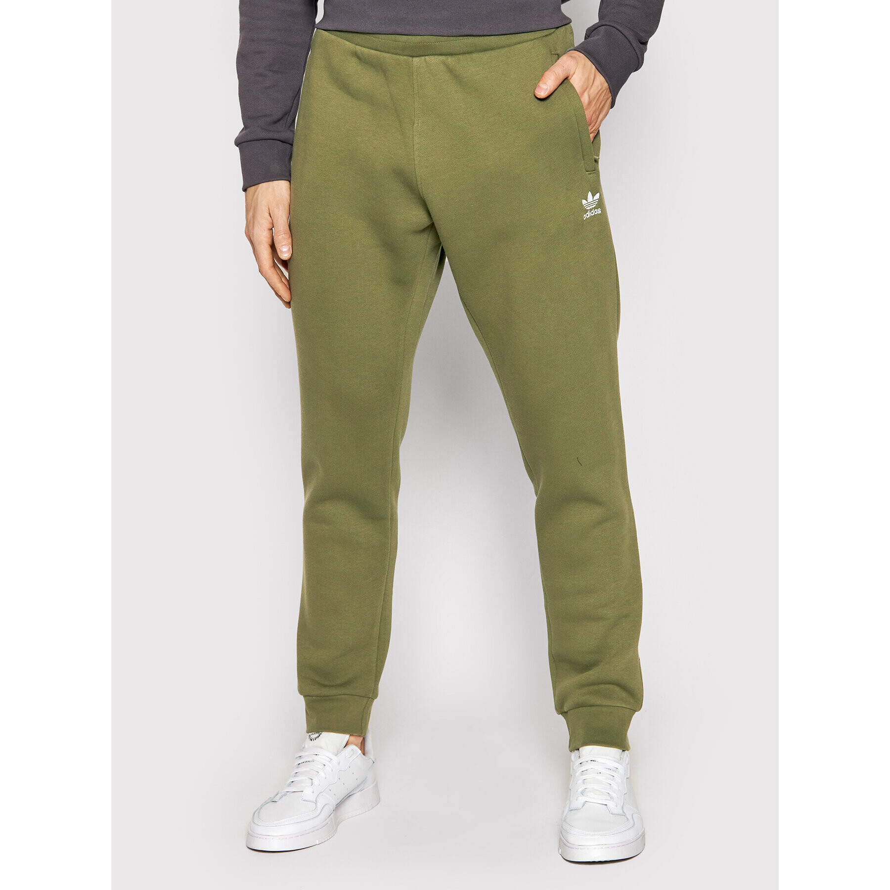 adidas Melegítő alsó adicolor Essentials Trefoil H65676 Zöld Slim Fit - Pepit.hu