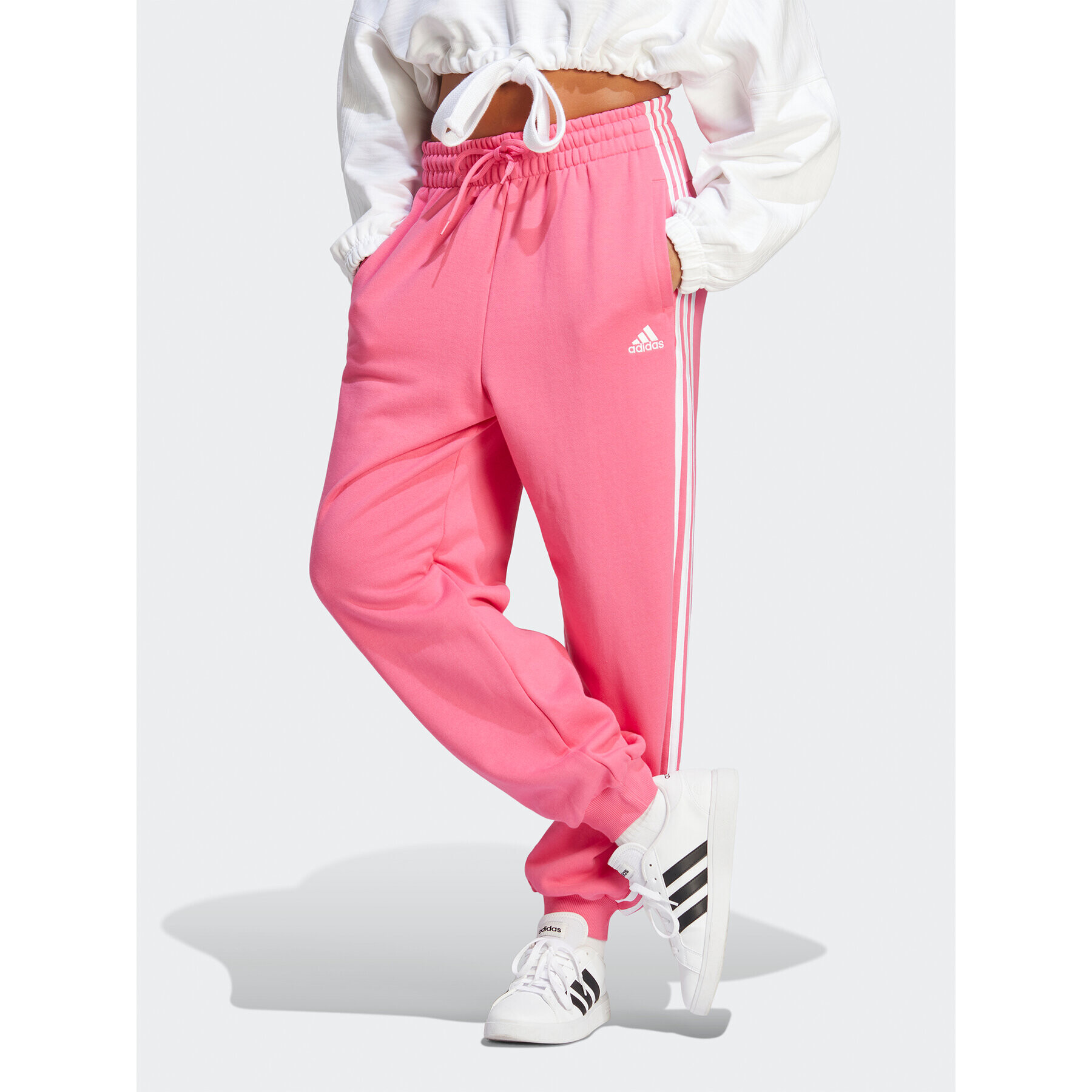 adidas Melegítő alsó Essentials 3-Stripes French Terry Loose-Fit Joggers H44578 Rózsaszín Loose Fit - Pepit.hu