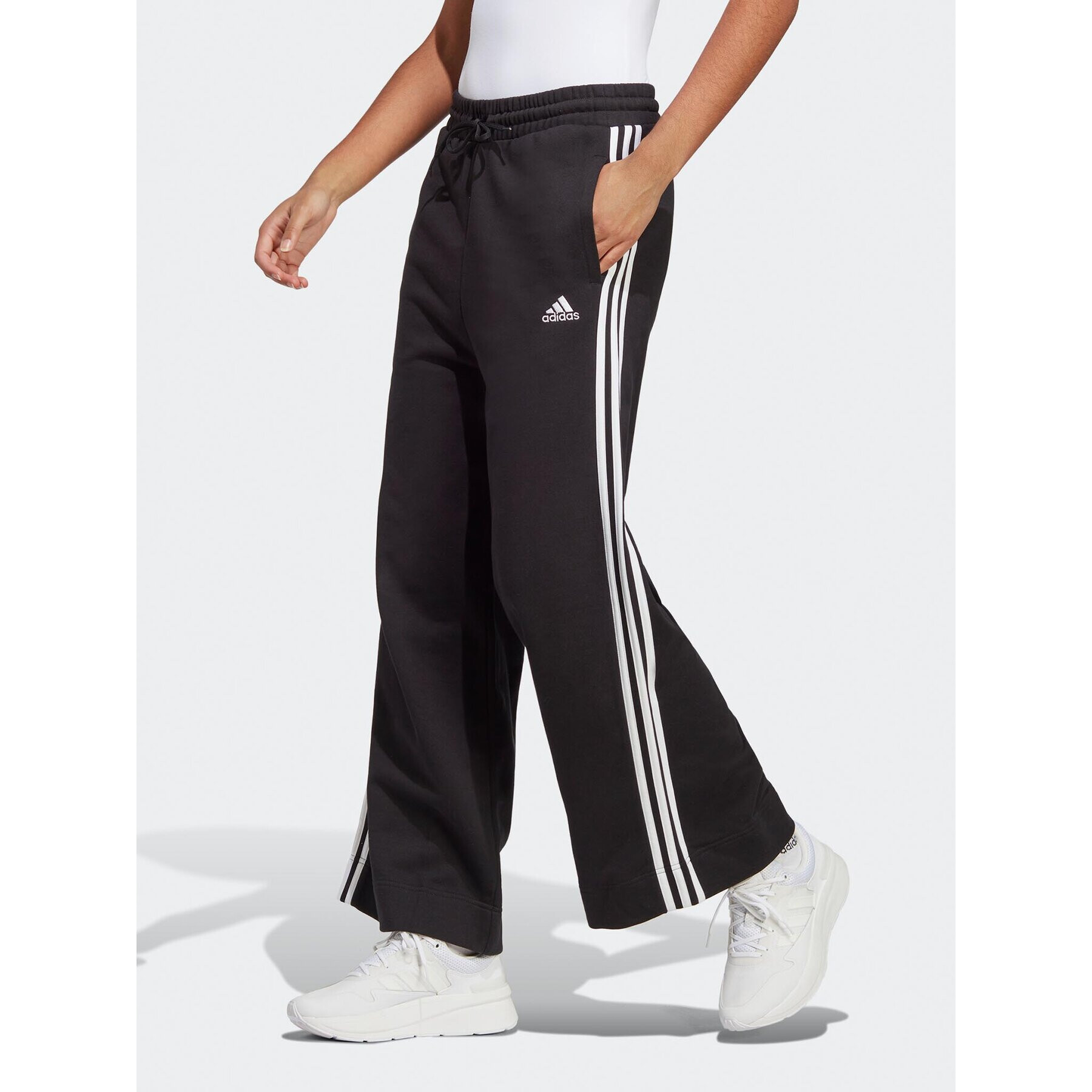 adidas Melegítő alsó Essentials 3-Stripes French Terry Wide Joggers IC8775 Fekete Regular Fit - Pepit.hu