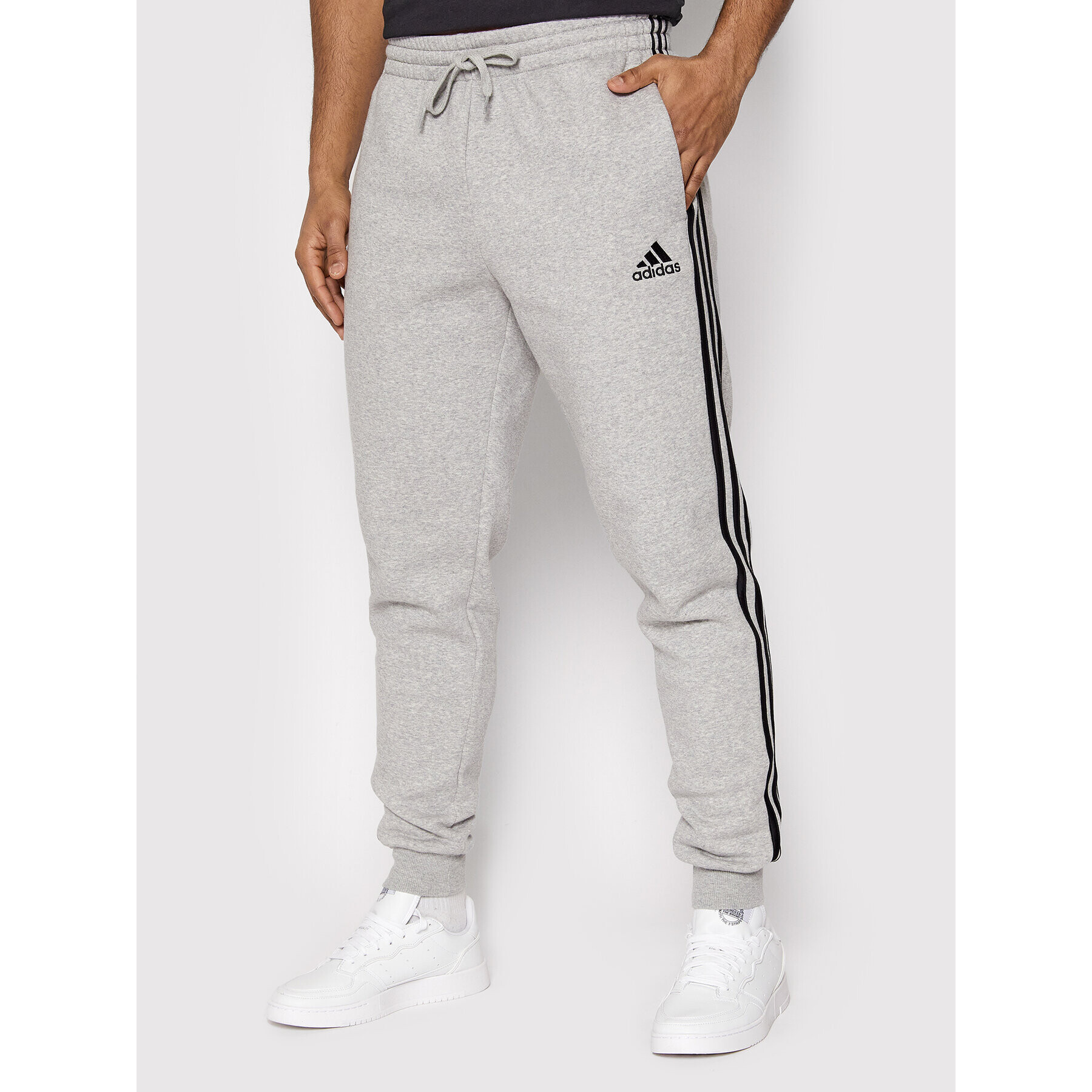 adidas Melegítő alsó Essentials 3-Stripes GM1091 Szürke Slim Fit - Pepit.hu