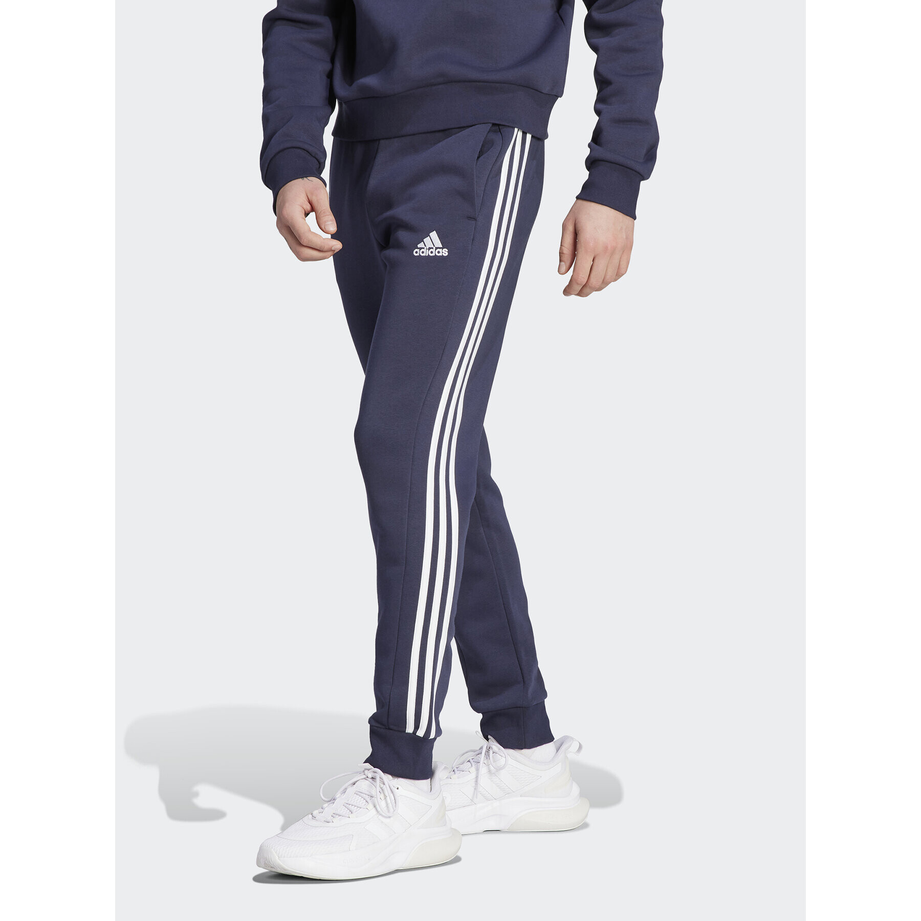 adidas Melegítő alsó Essentials Fleece 3-Stripes Cuff IJ6493 Sötétkék Regular Fit - Pepit.hu