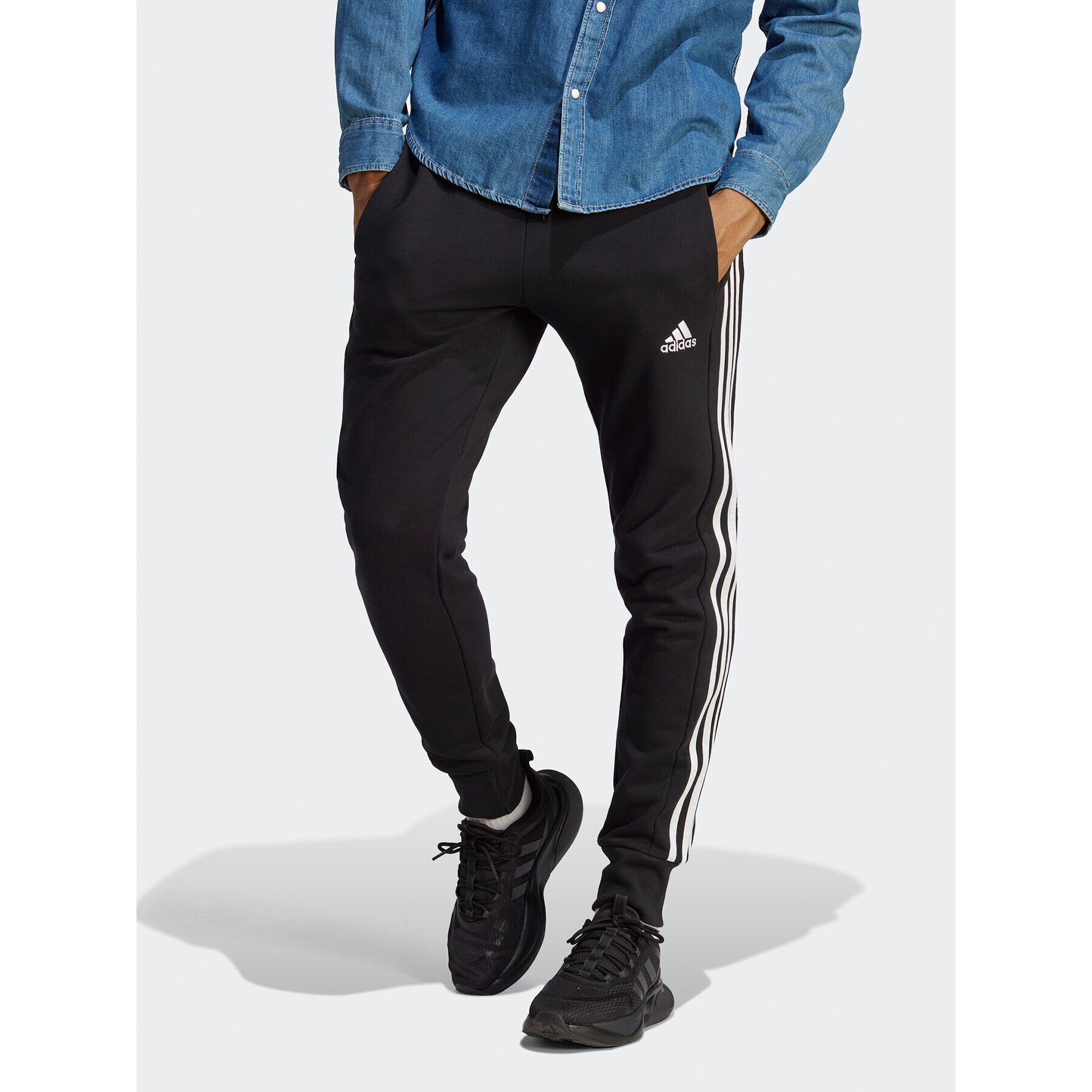 adidas Melegítő alsó Essentials French Terry Tapered Cuff 3-Stripes Joggers HA4337 Fekete Regular Fit - Pepit.hu