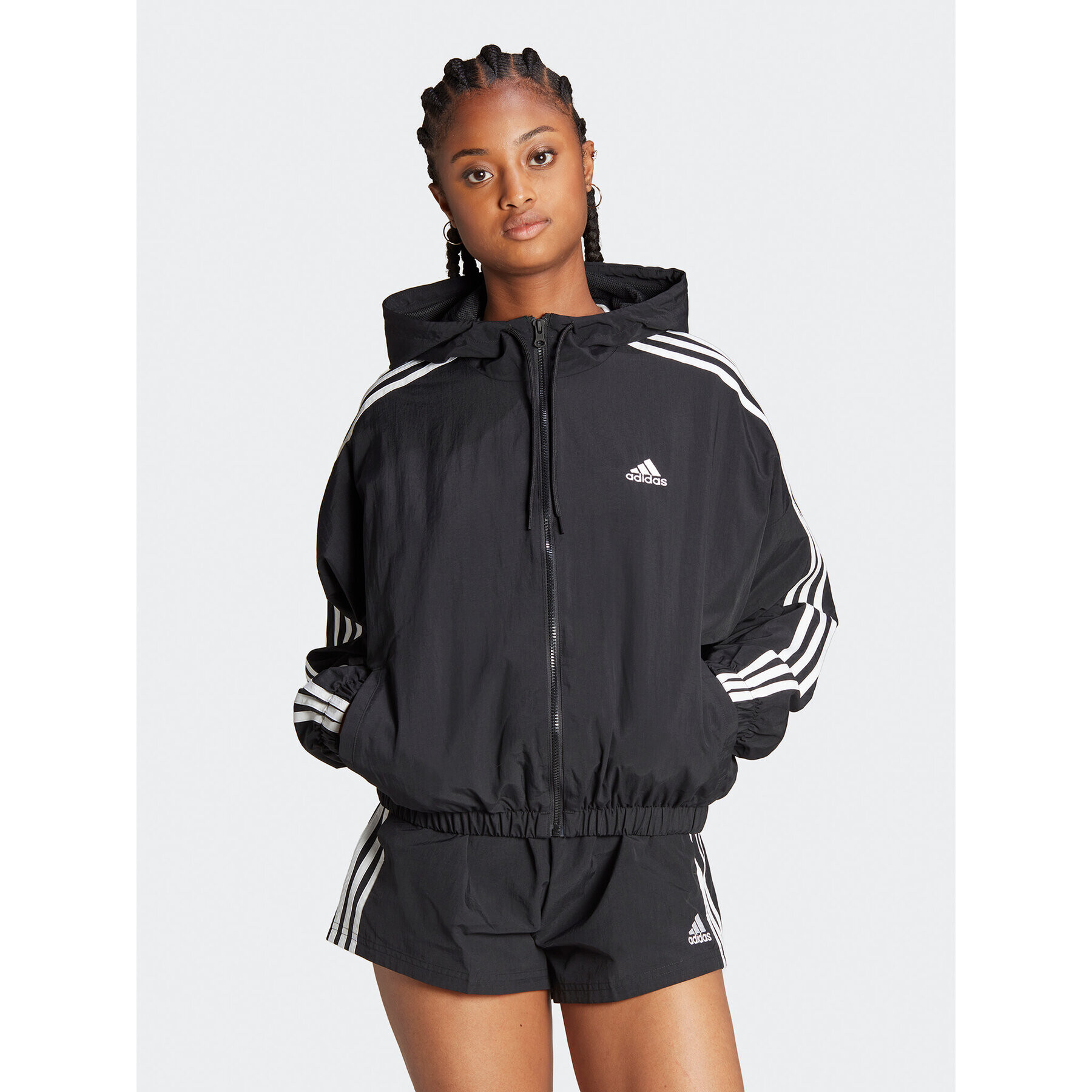 adidas Széldzseki Essentials 3-Stripes Woven Windbreaker HT3399 Fekete Loose Fit - Pepit.hu