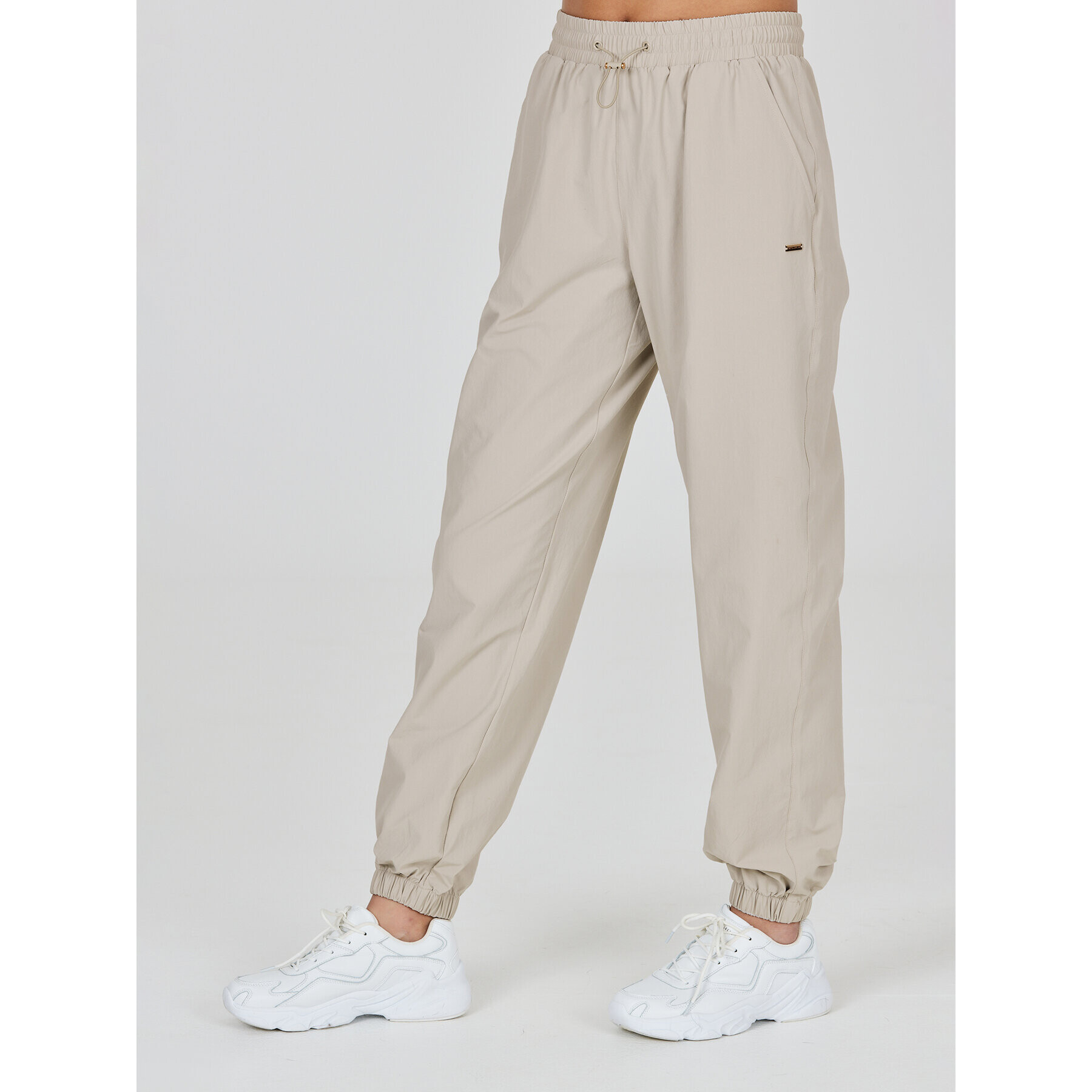 Athlecia Melegítő alsó Hero W Track Pants EA233336 Szürke Regular Fit - Pepit.hu