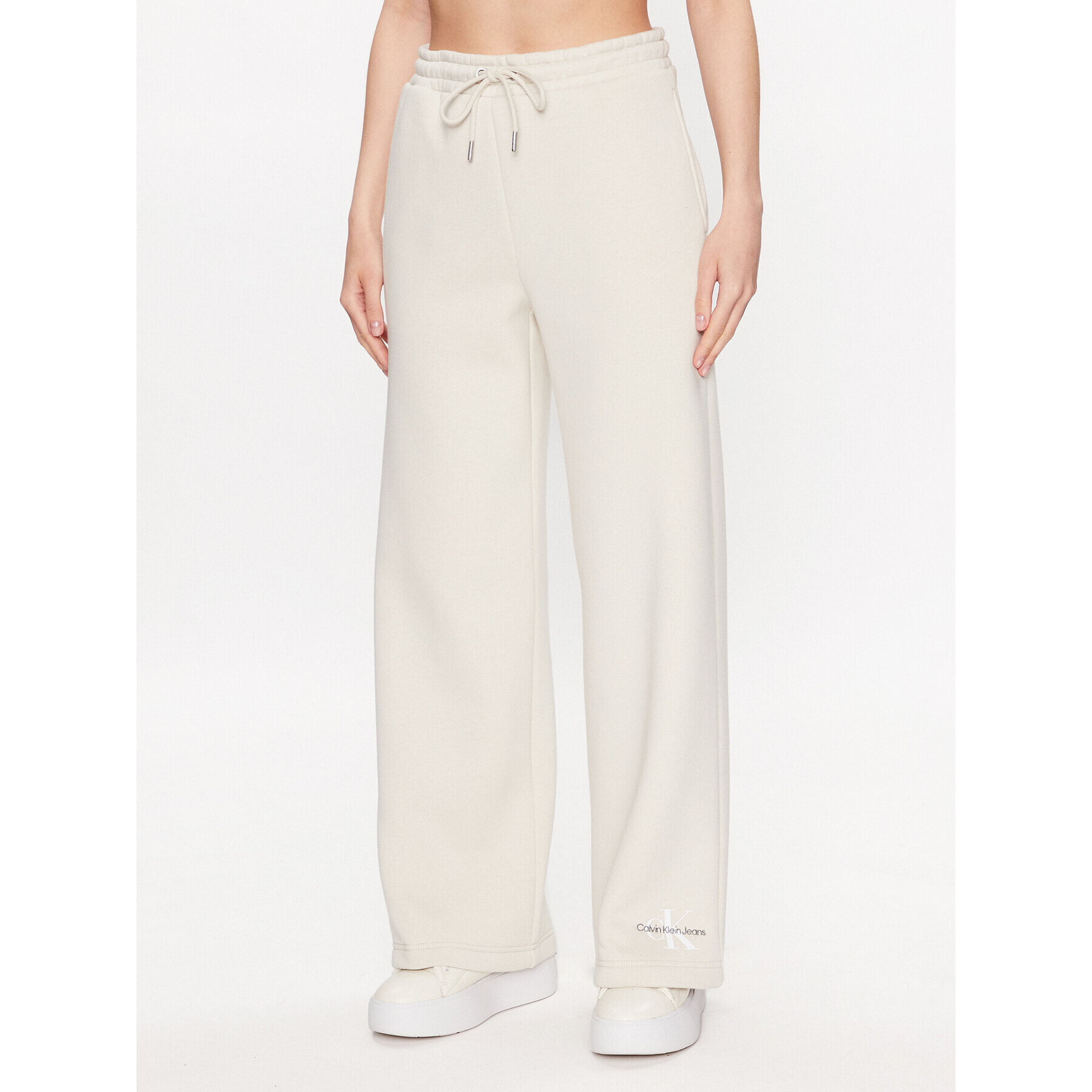 Calvin Klein Jeans Melegítő alsó J20J221296 Ekru Relaxed Fit - Pepit.hu