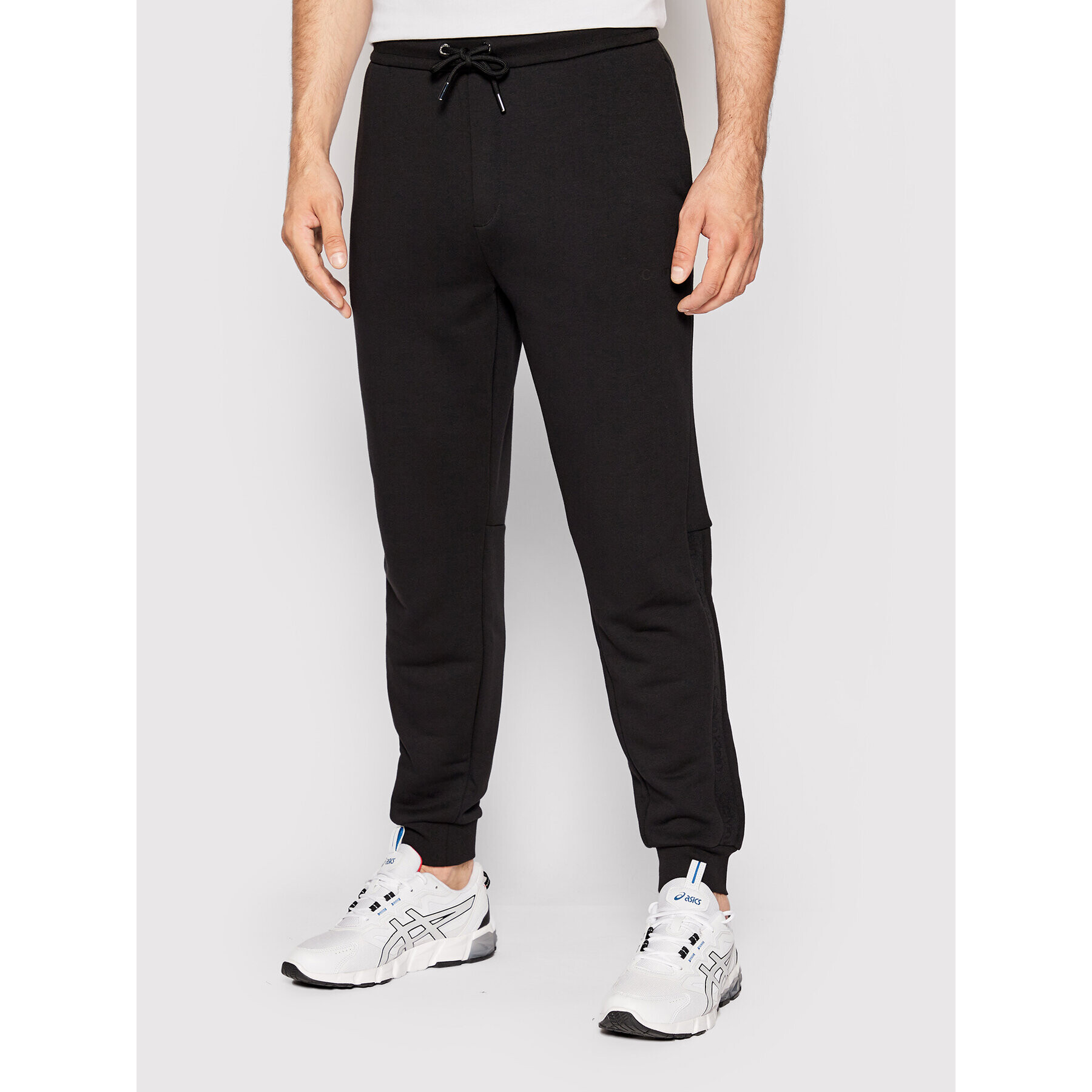 Calvin Klein Melegítő alsó Elevated Logo K10K109722 Fekete Regular Fit - Pepit.hu