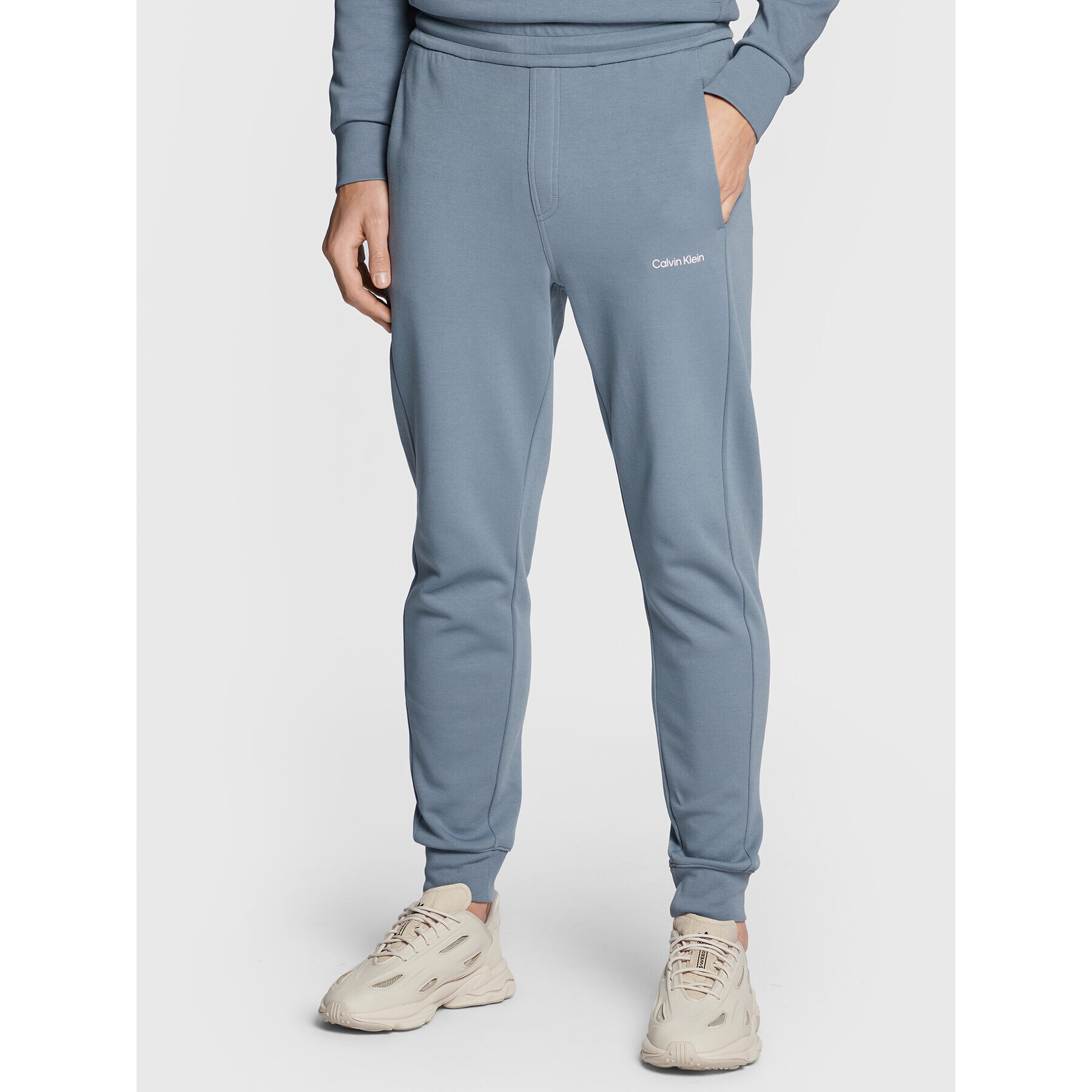 Calvin Klein Melegítő alsó Micro Logo K10K109940 Szürke Relaxed Fit - Pepit.hu