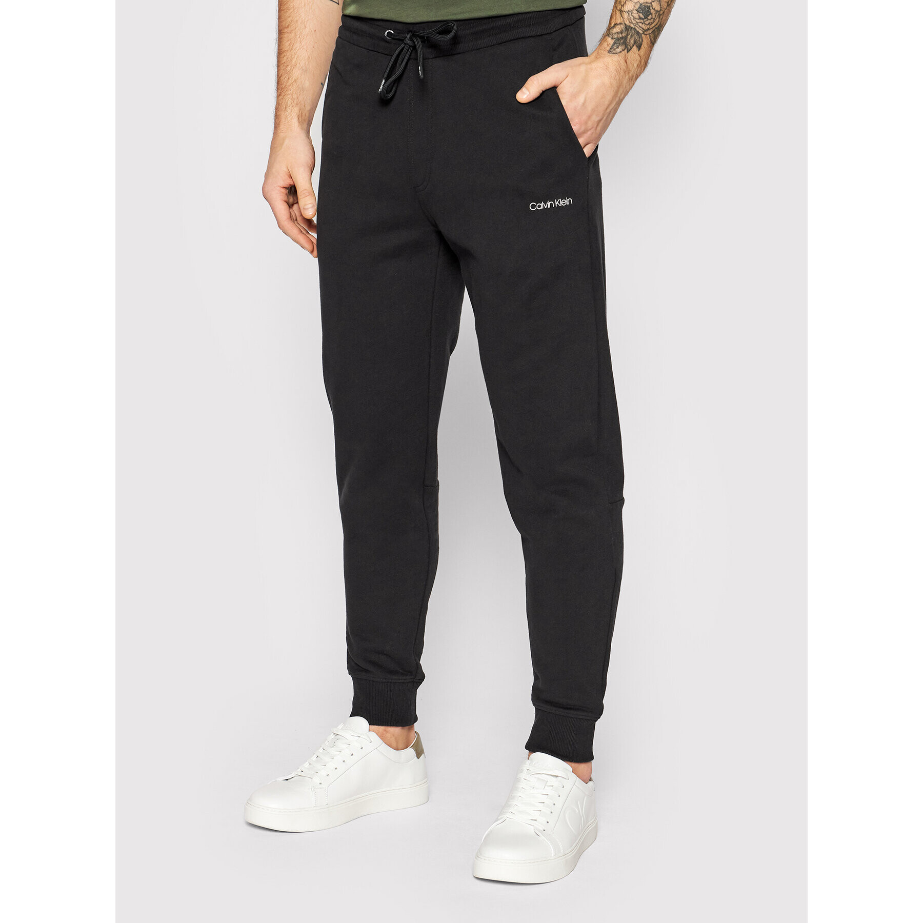 Calvin Klein Melegítő alsó Small Logo K10K107954 Fekete Regular Fit - Pepit.hu