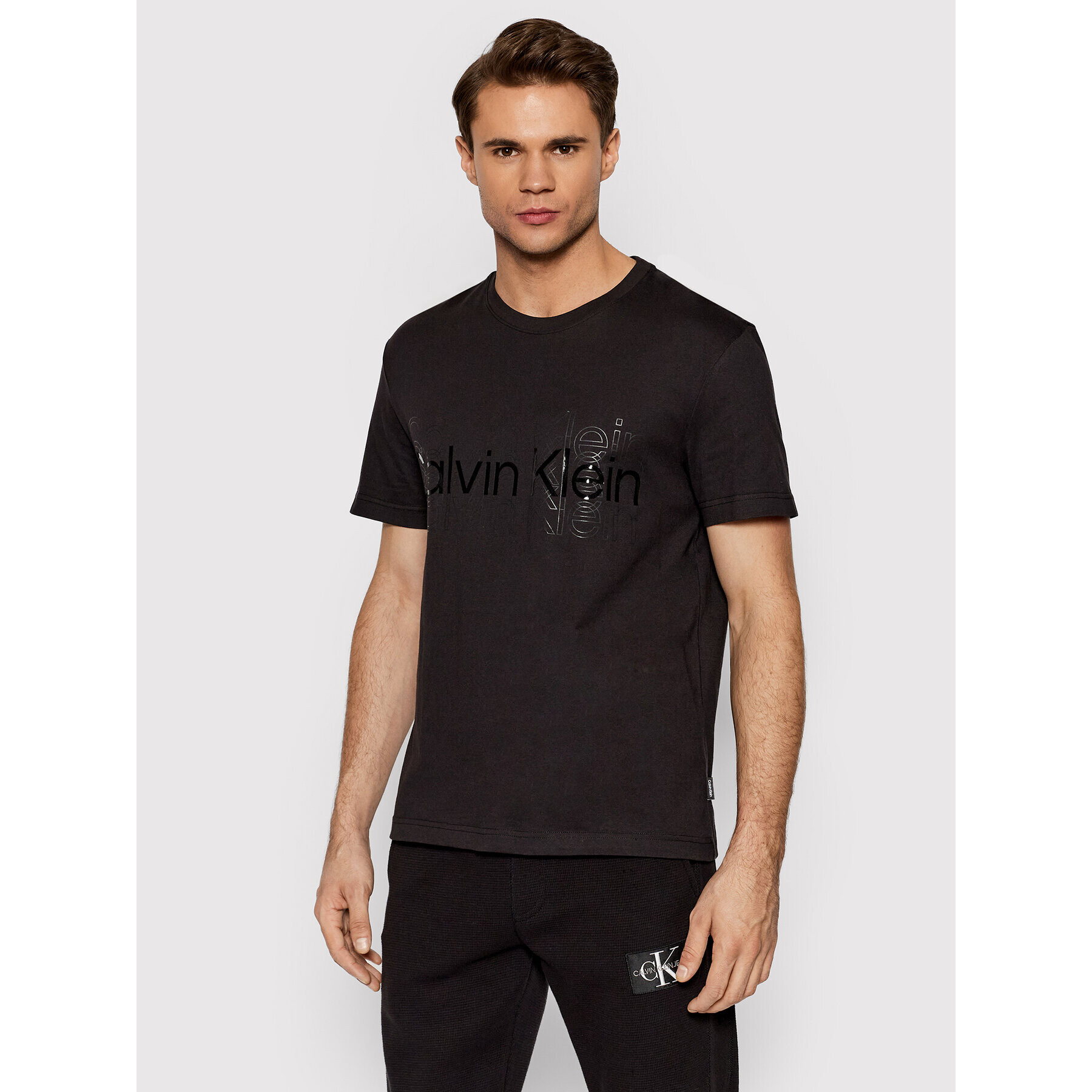 Calvin Klein Póló Multi Logo K10K107606 Fekete Regular Fit - Pepit.hu