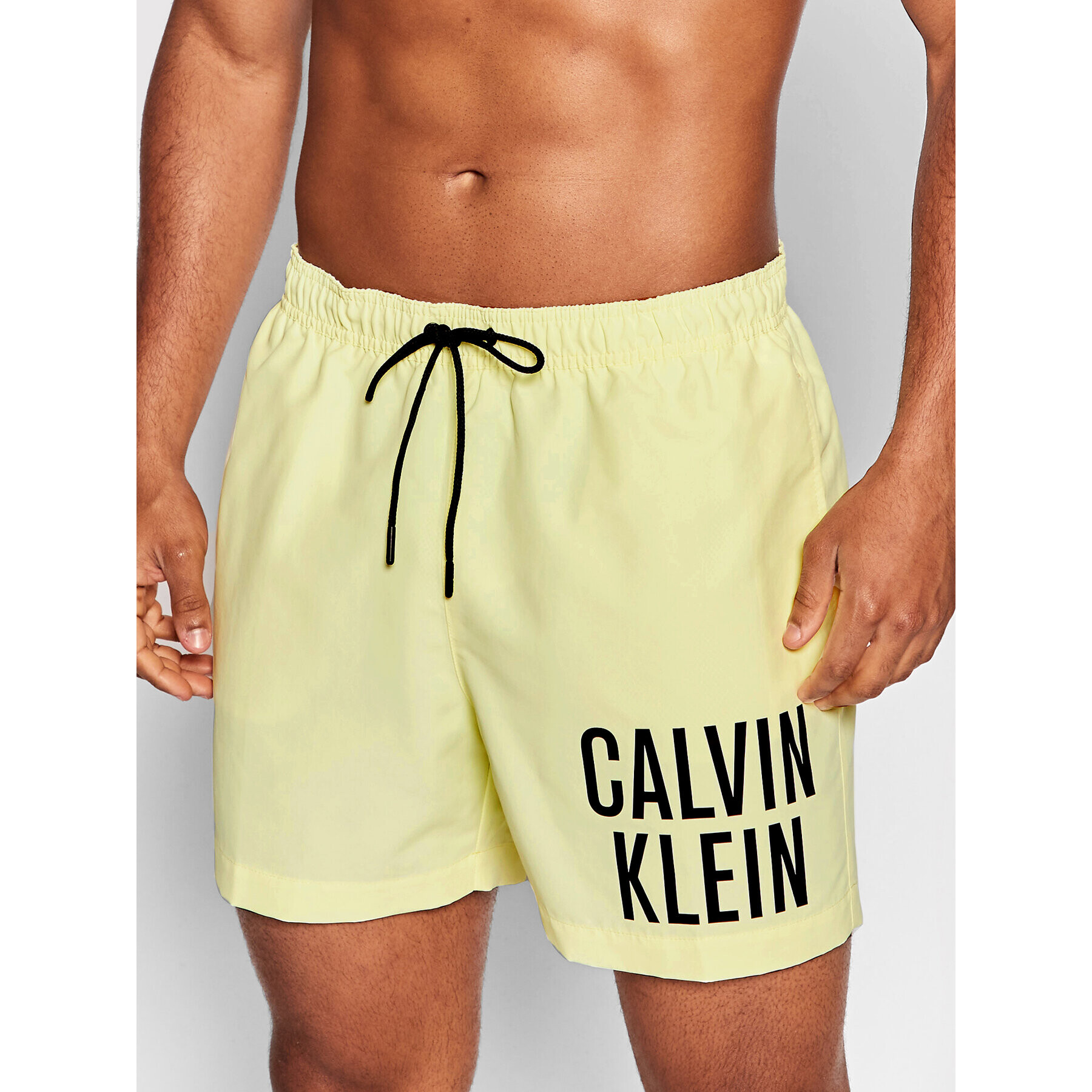 Calvin Klein Swimwear Úszónadrág Intense Power KM0KM00701 Sárga Regular Fit - Pepit.hu