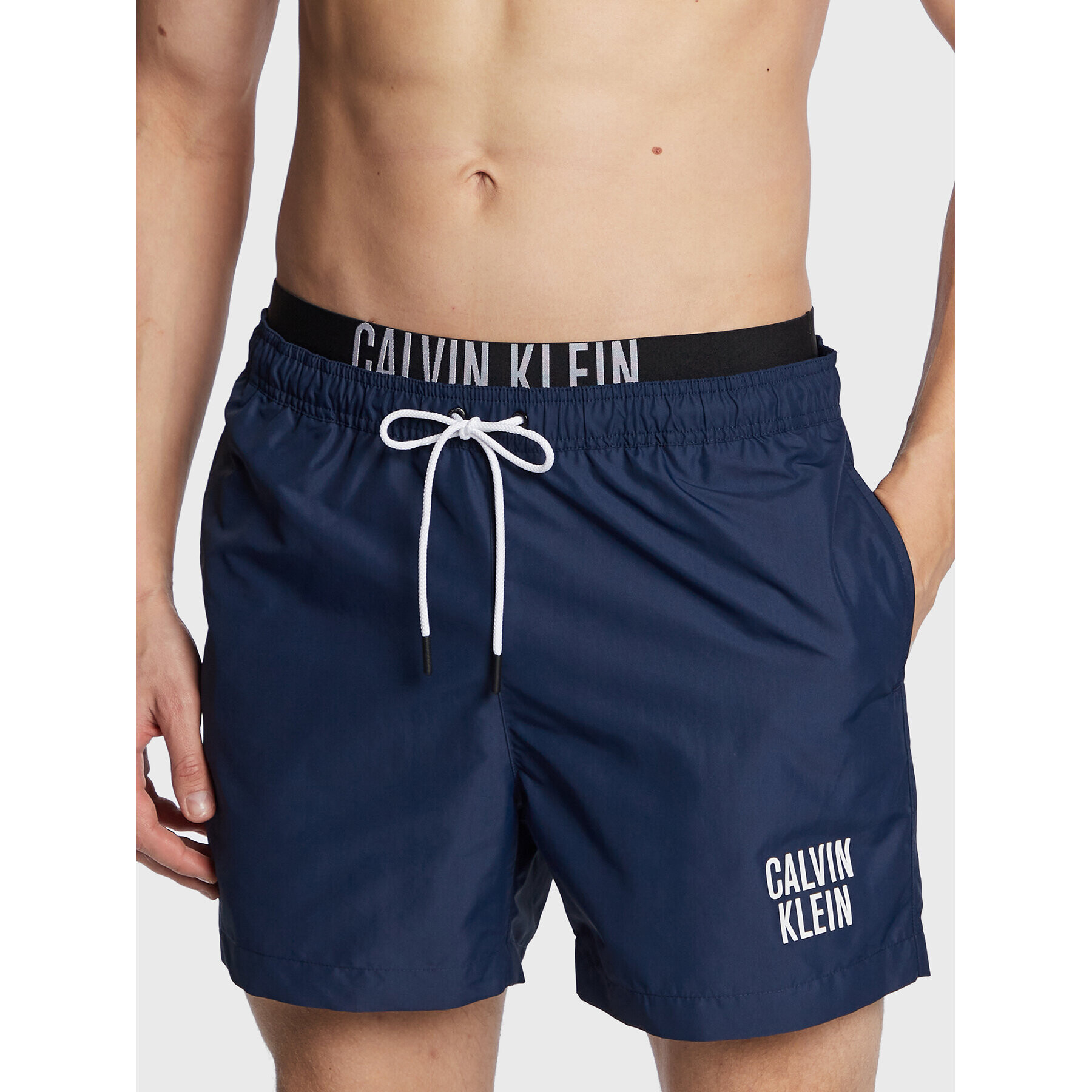 Calvin Klein Swimwear Úszónadrág KM0KM00798 Sötétkék Regular Fit - Pepit.hu