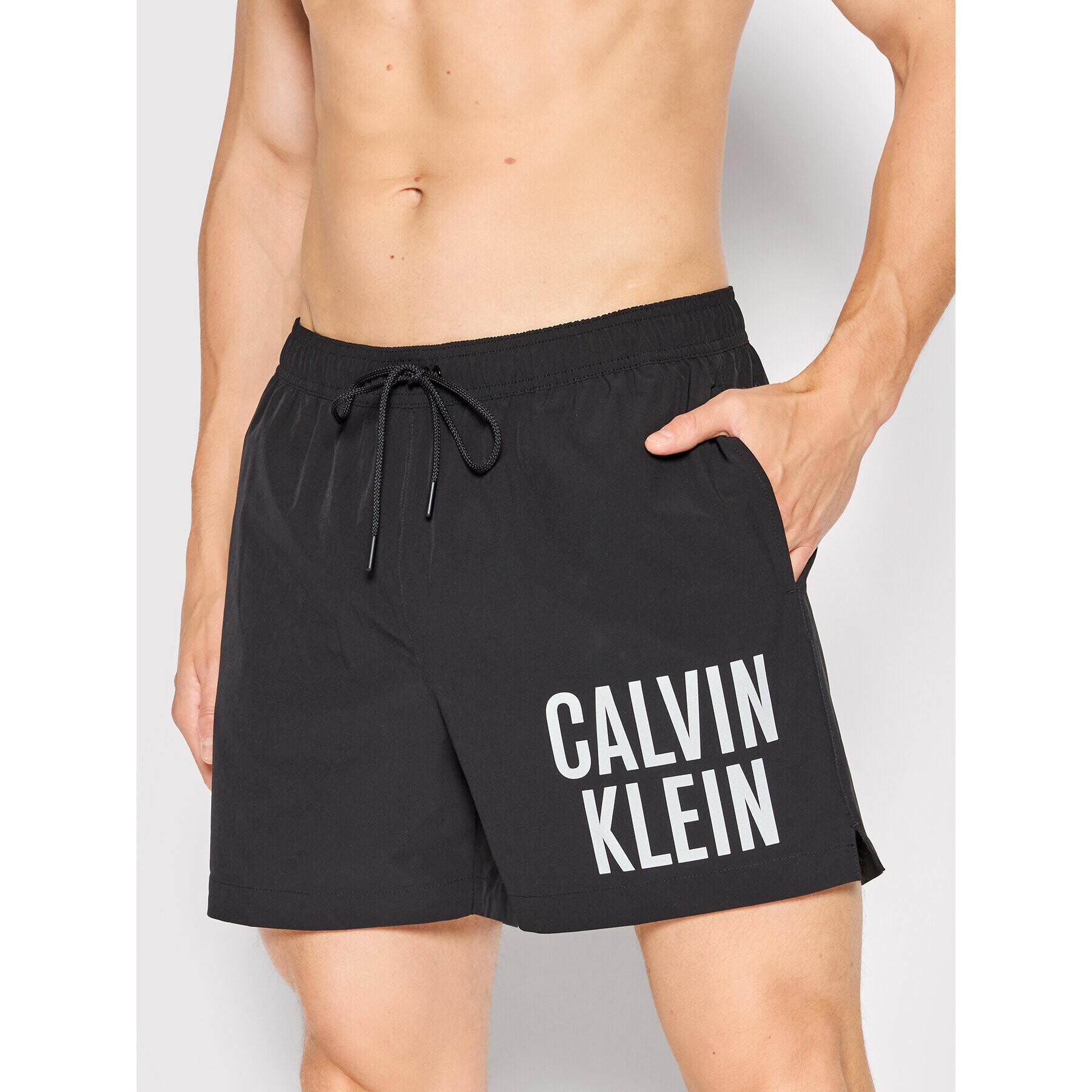 Calvin Klein Swimwear Úszónadrág Medium KM0KM00705 Fekete Regular Fit - Pepit.hu