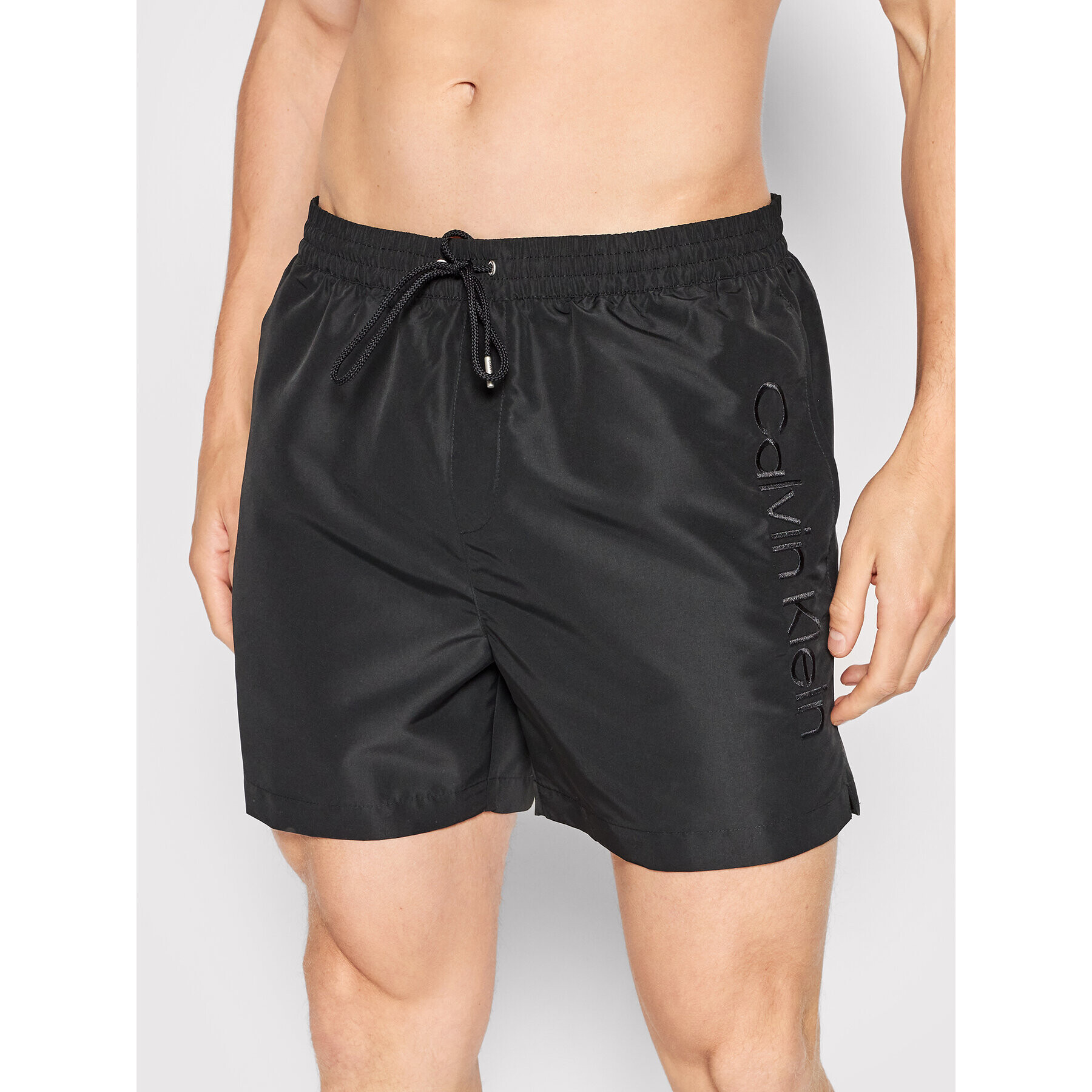 Calvin Klein Swimwear Úszónadrág Medium KM0KM00718 Fekete Regular Fit - Pepit.hu