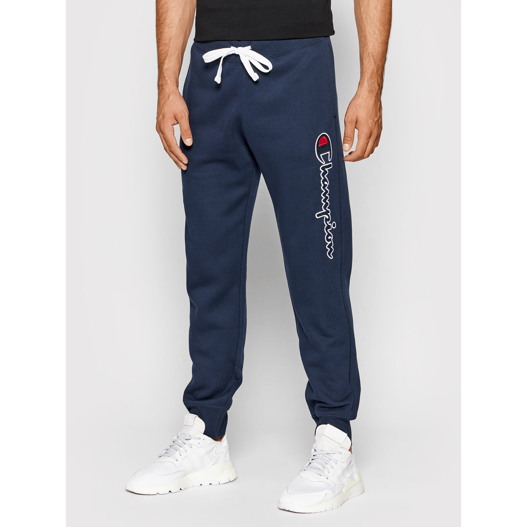 Champion Melegítő alsó Blend Vertical Script Logo 216472 Sötétkék Regular Fit - Pepit.hu