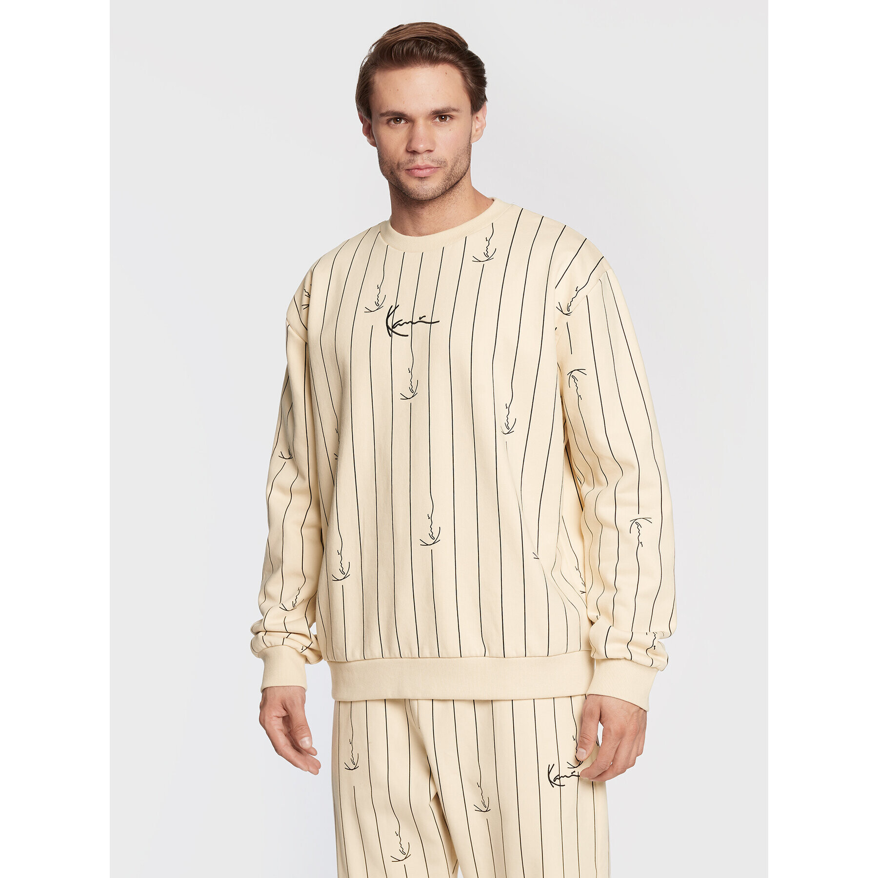 Karl Kani Pulóver Small Signature Logo Pinstripe 6020889 Bézs Relaxed Fit - Pepit.hu