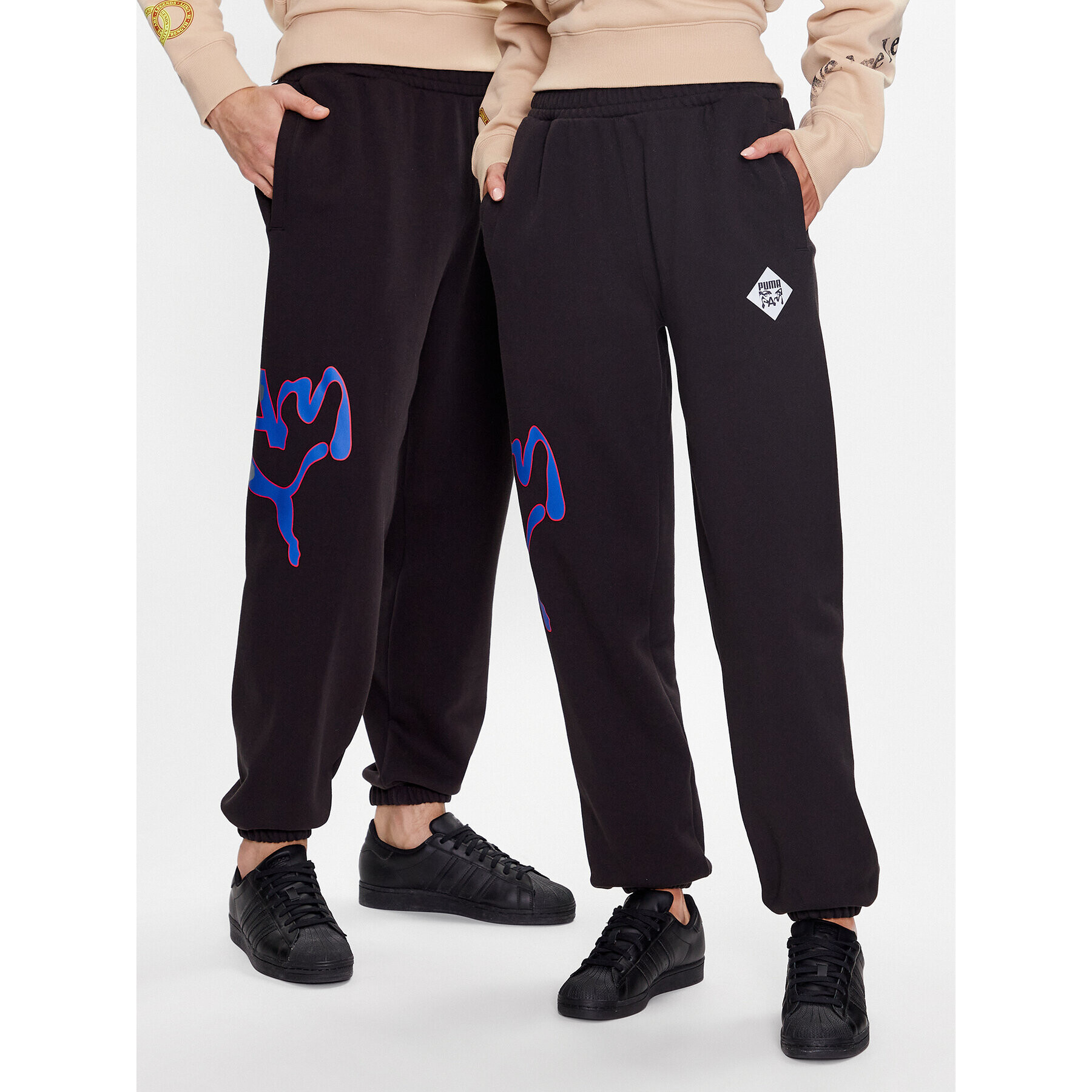 Puma Melegítő alsó Unisex P.A.M 620229 Fekete Relaxed Fit - Pepit.hu