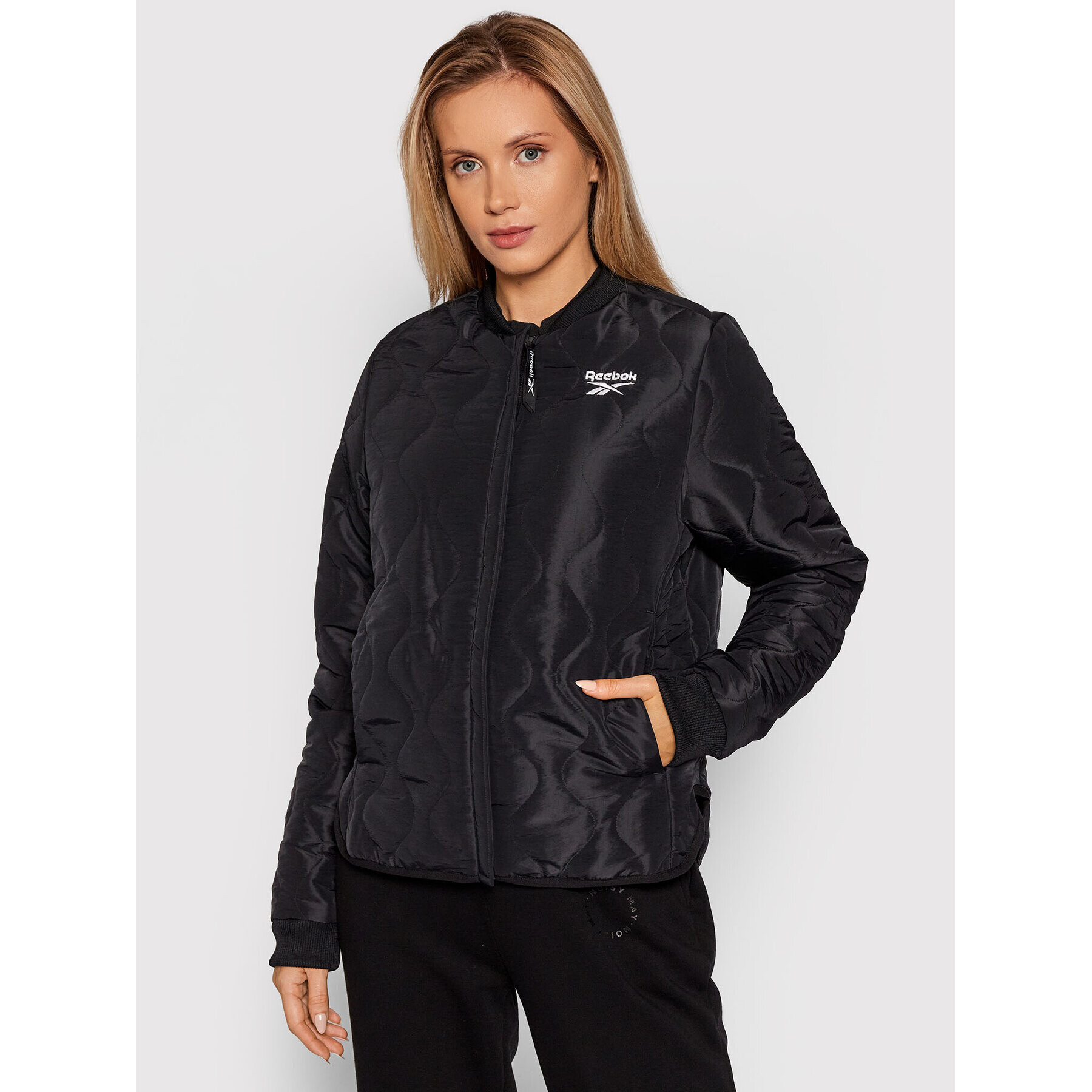 Reebok Pehelykabát Outerwear Core GU5773 Fekete Regular Fit - Pepit.hu