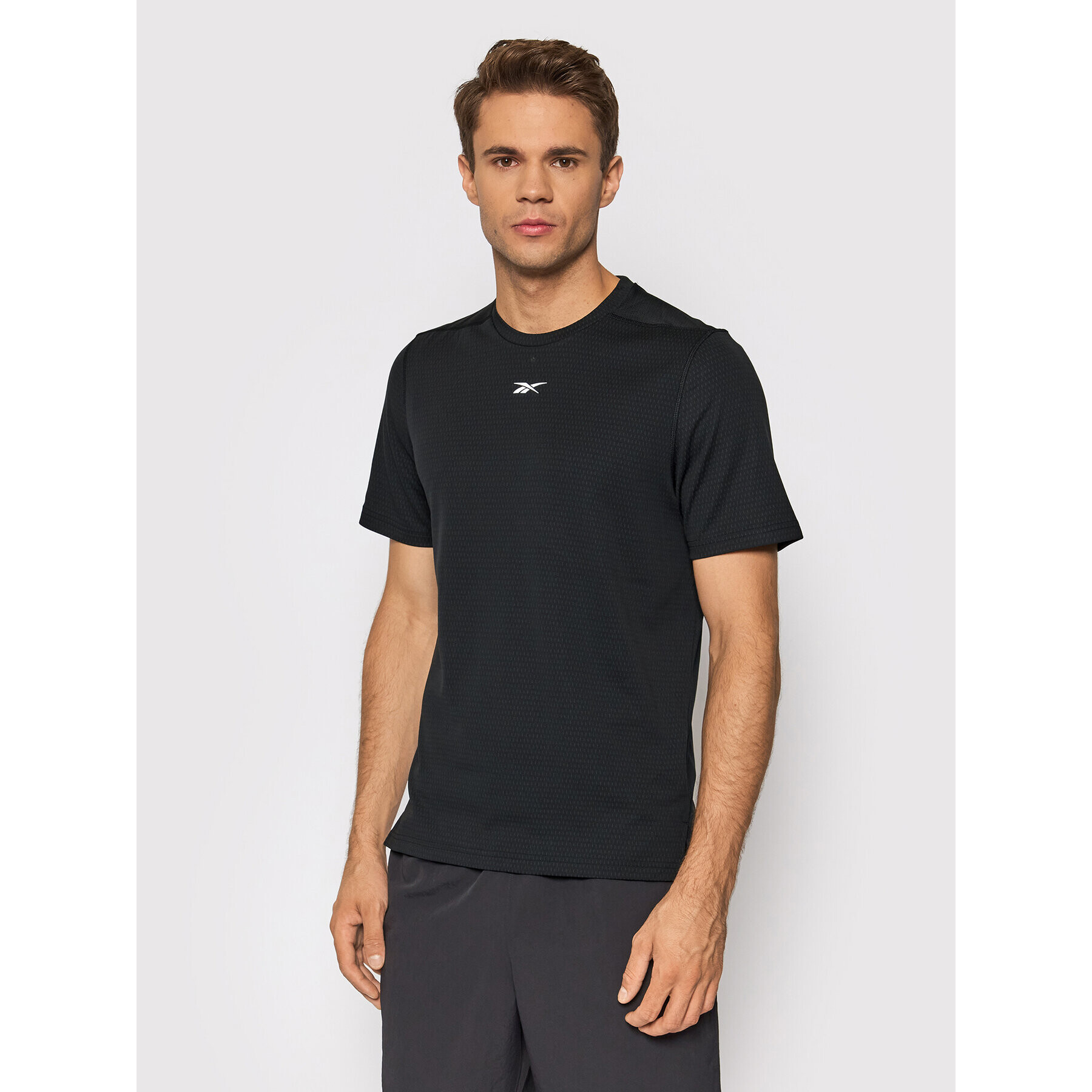 Reebok Technikai póló Sweatshift Move GN9099 Fekete Slim Fit - Pepit.hu