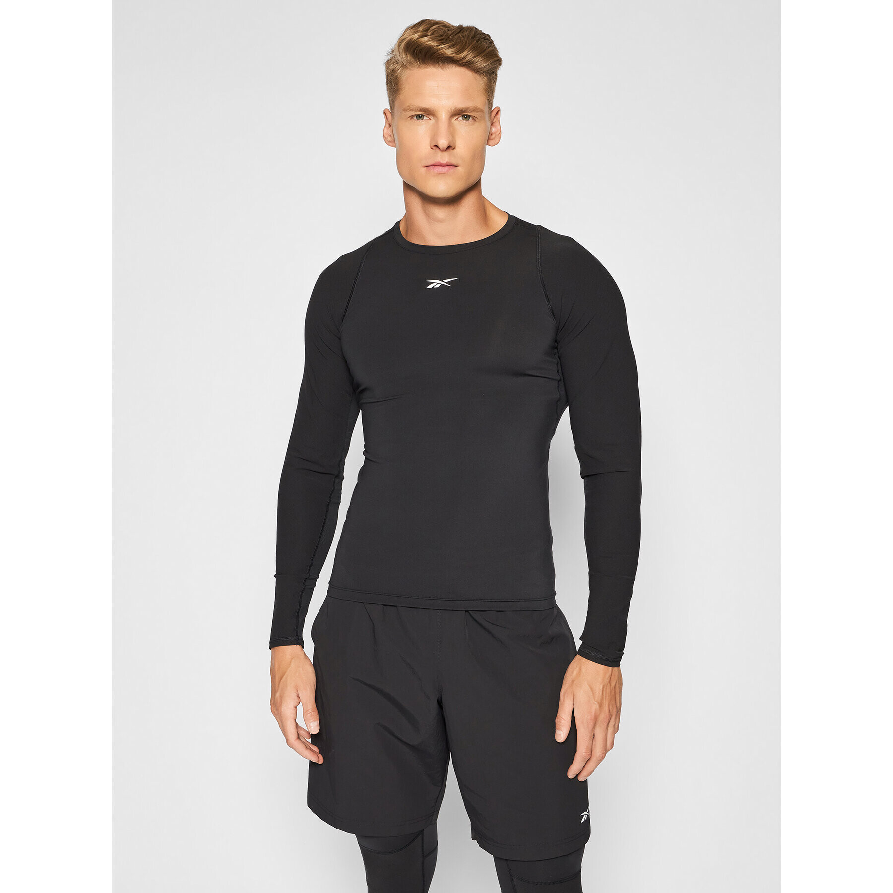 Reebok Technikai póló United By Fitness GT3225 Fekete Compression Fit - Pepit.hu