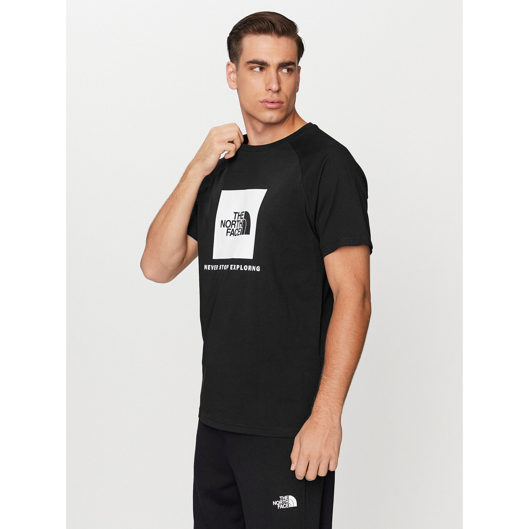 The North Face Póló M S/S Raglan Redbox Tee - EuNF0A3BQOKY41 Fekete Regular Fit - Pepit.hu