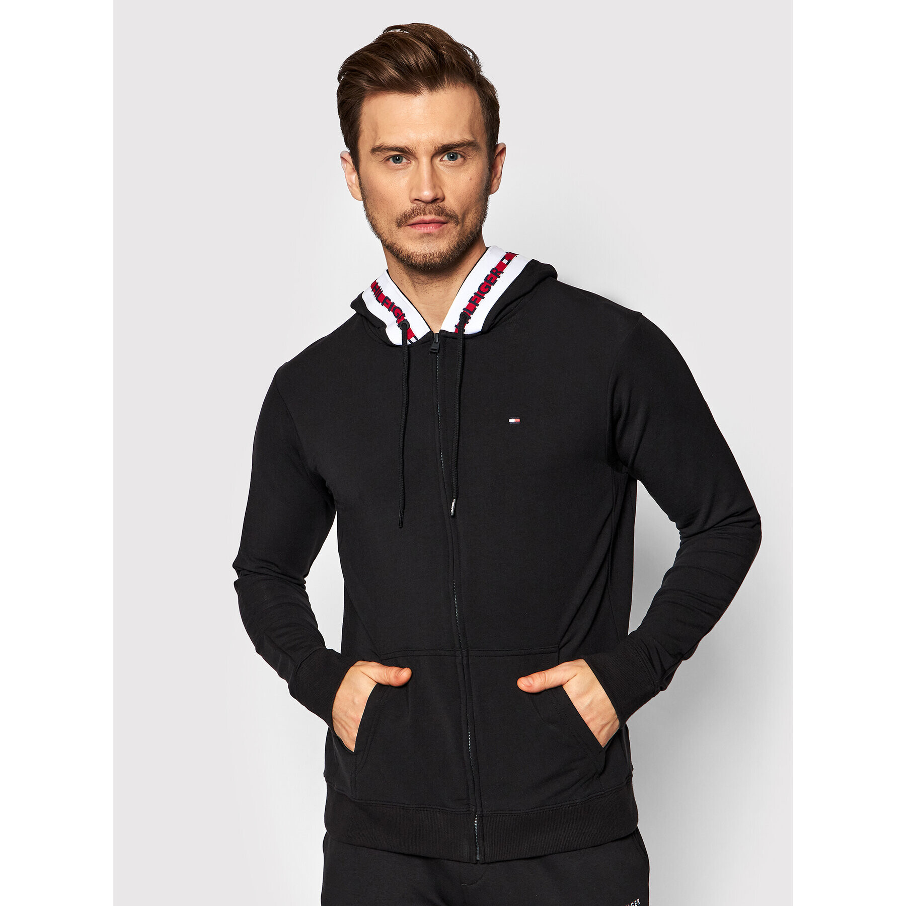 Tommy Hilfiger Pulóver UM0UM01929 Fekete Regular Fit - Pepit.hu