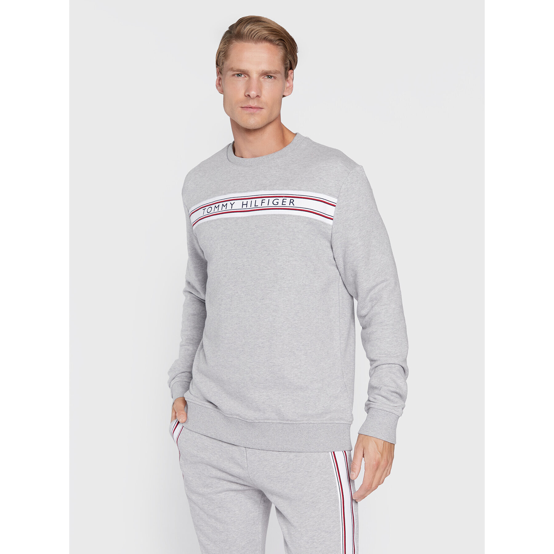 Tommy Hilfiger Pulóver UM0UM02426 Szürke Regular Fit - Pepit.hu