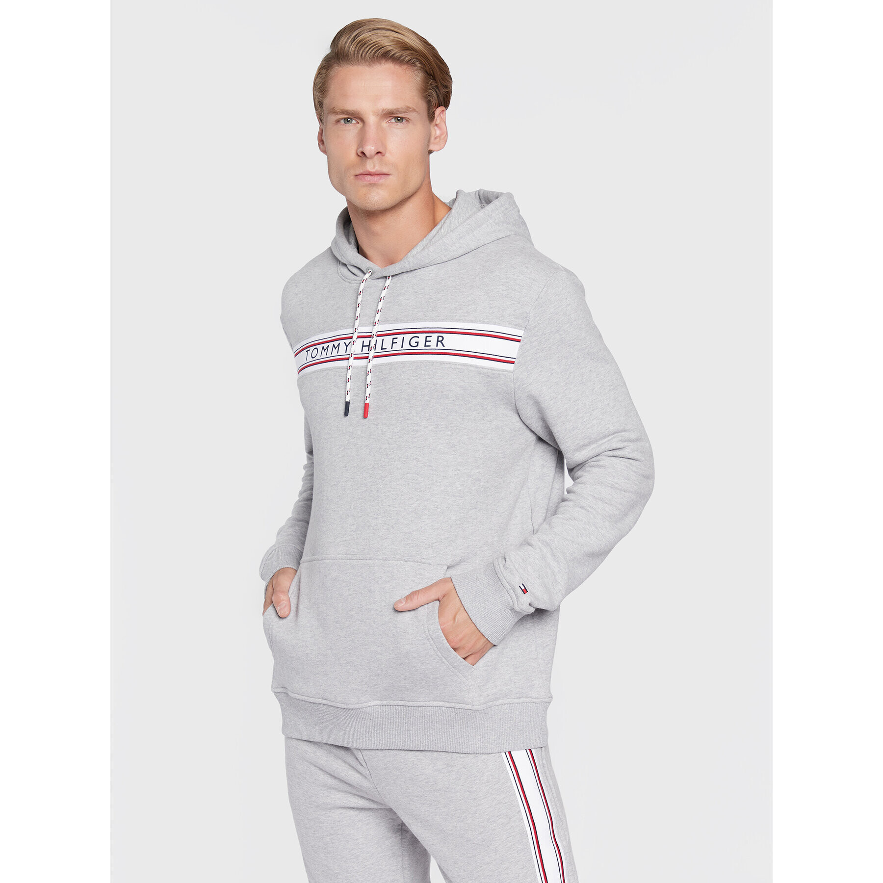 Tommy Hilfiger Pulóver UM0UM02427 Szürke Regular Fit - Pepit.hu