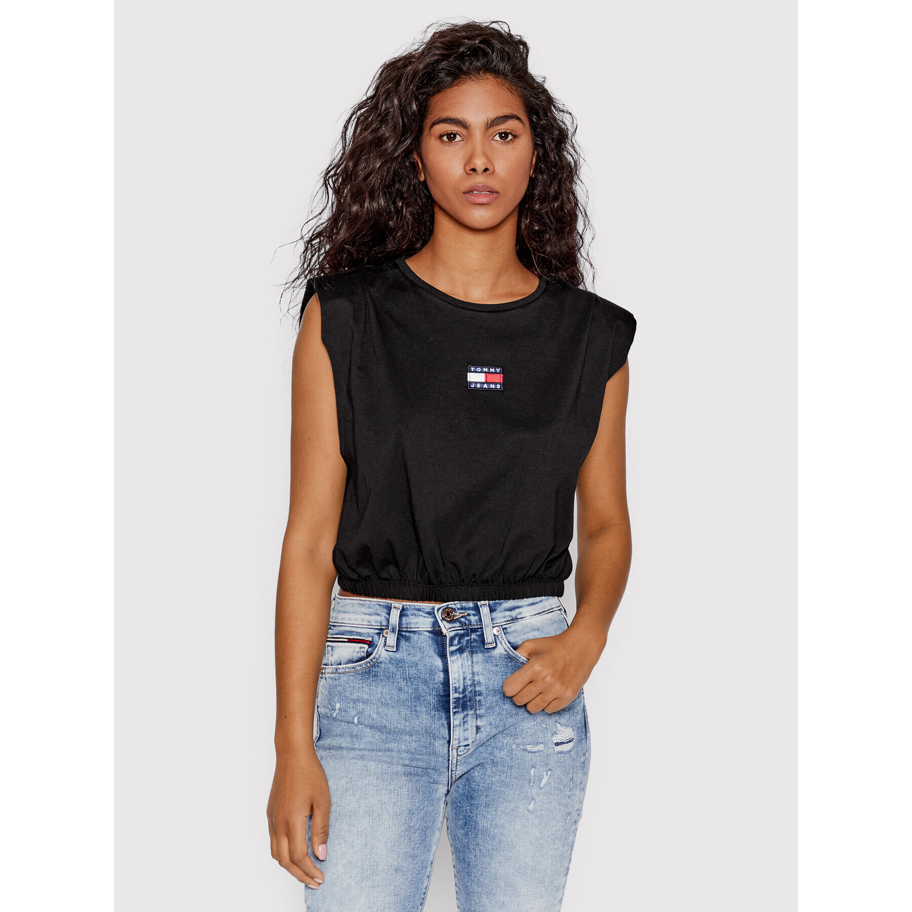 Tommy Jeans Blúz DW0DW12609 Fekete Cropped Fit - Pepit.hu