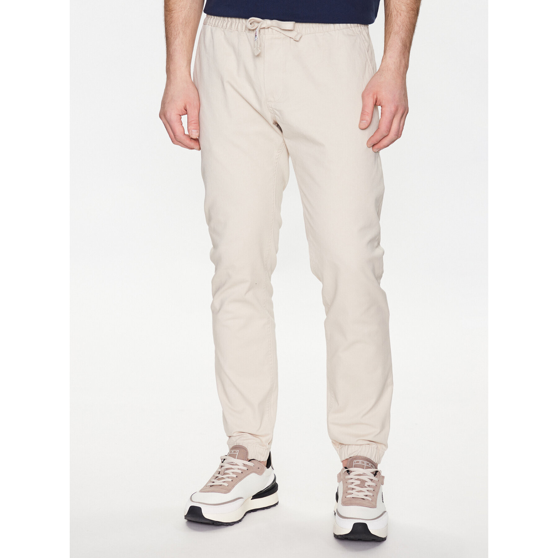 Tommy Jeans Joggers Scanton DM0DM15969 Bézs Slim Fit - Pepit.hu