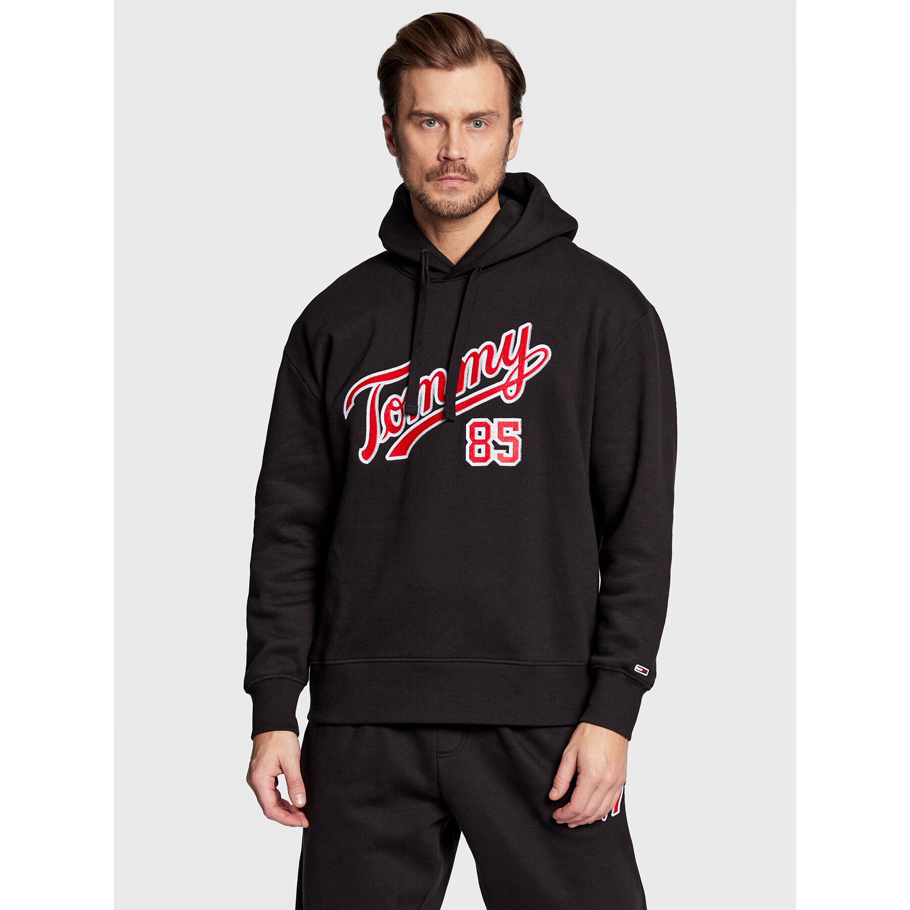 Tommy Jeans Pulóver College DM0DM15711 Fekete Relaxed Fit - Pepit.hu