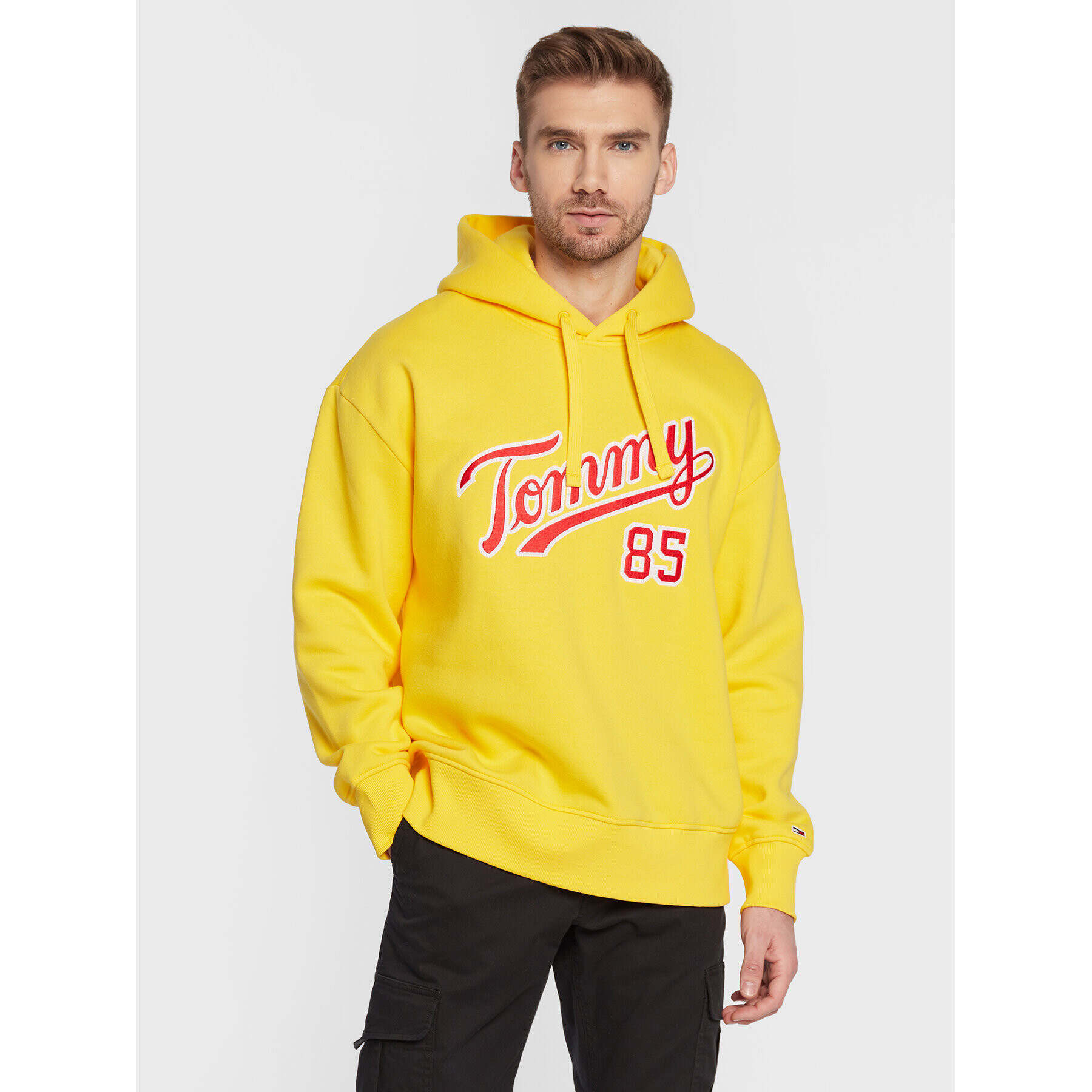 Tommy Jeans Pulóver College DM0DM15711 Sárga Relaxed Fit - Pepit.hu