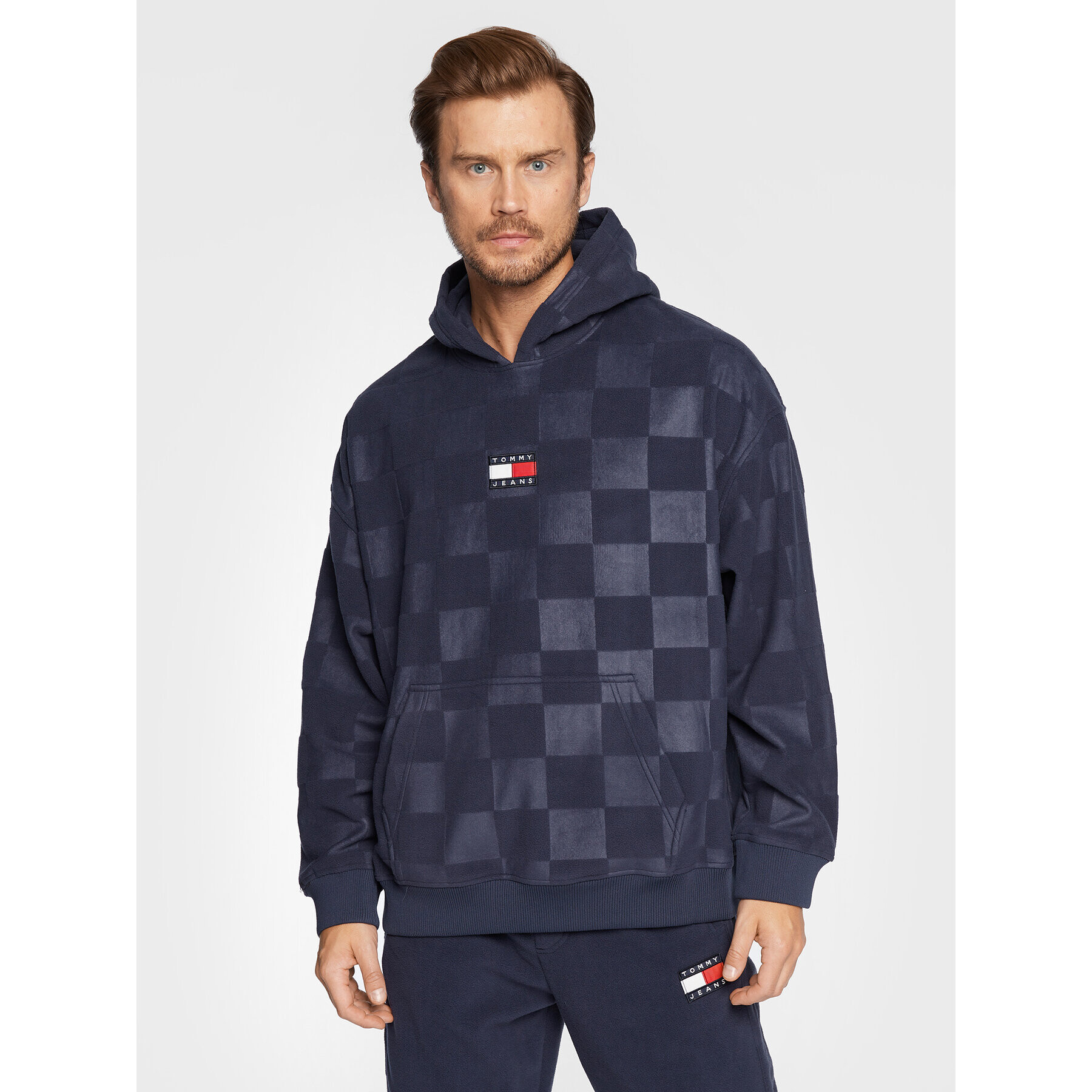 Tommy Jeans Pulóver Skater Checkerboard DM0DM15017 Sötétkék Relaxed Fit - Pepit.hu