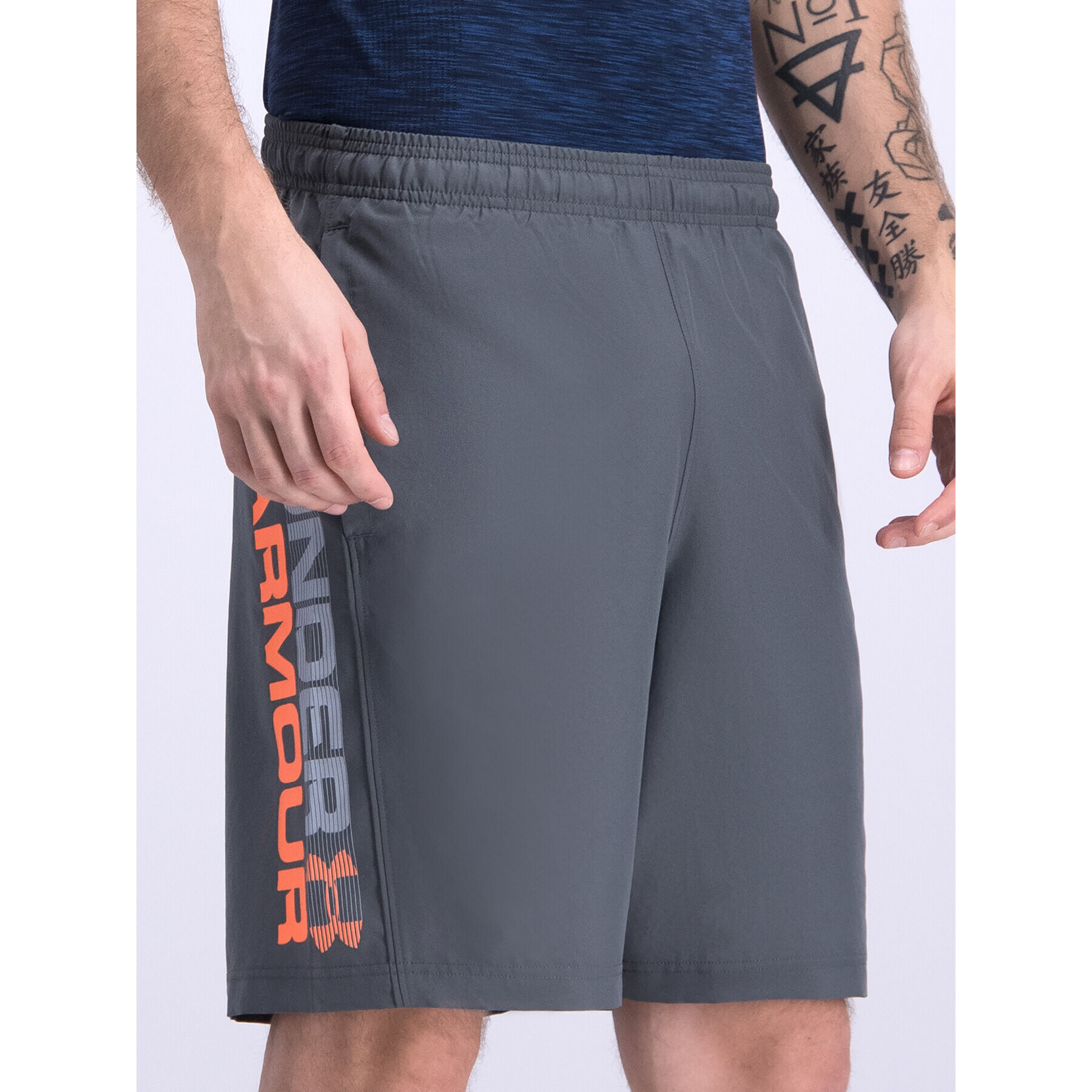 Under Armour Sport rövidnadrág UA Woven Graphic Wordmark 1320203 Szürke Regular Fit - Pepit.hu